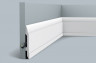 Гибкий плинтус для пола Orac Decor Duropolymer SX104F белый полистирол 148х17 мм 200 см